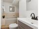 Modern bathroom boasts updated vanity, fixtures, and a shower-tub combination at 14072 W Alaska Dr, Lakewood, CO 80228