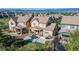 Aerial view of backyard features a patio with a dining area and seating area at 651 Tiger Lily Way, Highlands Ranch, CO 80126