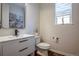 Chic half-bathroom with modern fixtures, a sleek vanity, and stylish decor at 651 Tiger Lily Way, Highlands Ranch, CO 80126