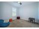 Spacious room featuring natural light, ceiling fan, and ample space for versatile use at 651 Tiger Lily Way, Highlands Ranch, CO 80126