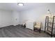 Room featuring versatile seating, stylish decor, and modern lighting at 651 Tiger Lily Way, Highlands Ranch, CO 80126