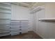 Spacious walk-in closet with ample shelving and storage solutions at 651 Tiger Lily Way, Highlands Ranch, CO 80126