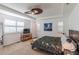 Bright main bedroom featuring a tray ceiling, ceiling fan, and neutral tones at 651 Tiger Lily Way, Highlands Ranch, CO 80126