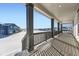 Spacious covered porch with view of surrounding houses at 39842 Penn Rd, Elizabeth, CO 80107