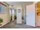 Mirrored closet and laundry access from bedroom at 3576 S Depew St # 104, Denver, CO 80235