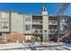 Exterior view of building showcasing multiple units and balconies at 3576 S Depew St # 104, Denver, CO 80235