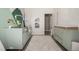 Bedroom with a crib, dresser, and a peaceful atmosphere at 1928 W 67Th Pl, Denver, CO 80221