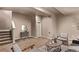 Spacious living room offering carpeted floors and neutral walls, creating a serene atmosphere at 1928 W 67Th Pl, Denver, CO 80221