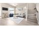 Inviting living room with comfortable seating, modern decor, and hardwood floors at 1928 W 67Th Pl, Denver, CO 80221