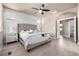 Inviting main bedroom with stylish decor, bedside tables, and a peaceful atmosphere at 1928 W 67Th Pl, Denver, CO 80221