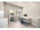 Dedicated home office with desk, chair, and a view overlooking the property at 1928 W 67Th Pl, Denver, CO 80221