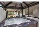 Backyard features a covered hot tub and ample space for relaxing and entertaining at 8595 S Yarrow St, Littleton, CO 80128