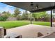 Large backyard with concrete patio is perfect for outdoor furniture and activities at 8595 S Yarrow St, Littleton, CO 80128