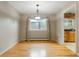 Bright dining room featuring hardwood floors, natural light and simple decor at 8595 S Yarrow St, Littleton, CO 80128