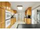 Well-equipped kitchen with plenty of cabinet space and modern appliances at 8595 S Yarrow St, Littleton, CO 80128