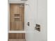 Modern walk-in shower featuring stylish tile, a built-in bench, and sleek fixtures at 5035 Vermillion Dr, Castle Rock, CO 80108