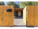 Front yard with wood fence and a welcoming entrance at 1020 Stuart St, Denver, CO 80204