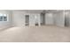 Large basement living area, featuring access to bathroom and rooms at 2143 Peralta Loop, Castle Rock, CO 80104