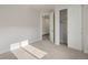 Bedroom featuring sliding closet and a doorway to another room at 2143 Peralta Loop, Castle Rock, CO 80104