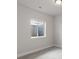 Neutral bedroom featuring a window with natural light and gray carpet at 2143 Peralta Loop, Castle Rock, CO 80104