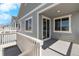 Outdoor deck with white railing, offering views of the neighborhood and access to the interior at 2143 Peralta Loop, Castle Rock, CO 80104