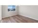 Dining room features hardwood floors and a large window with a view of the neighborhood at 2143 Peralta Loop, Castle Rock, CO 80104