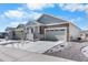 Charming single-Gathering home with stone accents, a two-car garage, and landscaping at 2143 Peralta Loop, Castle Rock, CO 80104