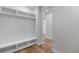 Mudroom with a built-in storage bench and coat rack, enhancing organization at 2143 Peralta Loop, Castle Rock, CO 80104