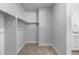 This walk-in closet is attached to the bathroom and has plenty of room for storage at 2143 Peralta Loop, Castle Rock, CO 80104