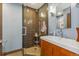 Stylish bathroom showcasing a glass-enclosed shower, sleek vanity, and modern lighting at 1499 Blake St # 6K, Denver, CO 80202
