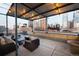 Rooftop deck with lounge seating overlooking the skyline for relaxing or entertaining at 1499 Blake St # 6K, Denver, CO 80202