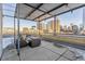 City views from this rooftop patio with a shaded seating area, an oasis in the sky at 1499 Blake St # 6K, Denver, CO 80202