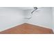 Bright basement area with wood plank flooring and painted walls at 4716 Broadway, Denver, CO 80216