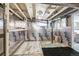 Basement under renovations features plumbing and exposed ceiling joists at 4716 Broadway, Denver, CO 80216