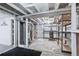 Unfinished basement with concrete flooring; has mechanicals and storage at 4716 Broadway, Denver, CO 80216