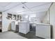 Basement laundry room featuring washer, dryer, freezer, and storage at 4716 Broadway, Denver, CO 80216