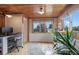 Home office with hardwood floors, many windows, desk and chair at 4716 Broadway, Denver, CO 80216