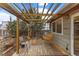Charming backyard patio featuring a pergola, swing, and seating perfect for outdoor relaxation and enjoyment at 3280 S Ouray Way, Aurora, CO 80013