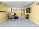 Spacious basement featuring a TV, ample seating, and a neutral carpet, ideal for entertaining and relaxation at 3280 S Ouray Way, Aurora, CO 80013