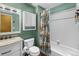 A practical, functional bathroom with good lighting features a tub and shower at 3280 S Ouray Way, Aurora, CO 80013