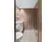 Compact bathroom features a toilet, vanity, and walk-in shower with glass door and neutral tile at 3280 S Ouray Way, Aurora, CO 80013