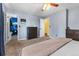 Comfortable bedroom with a ceiling fan includes access to the closet and a light-filled adjoining room at 3280 S Ouray Way, Aurora, CO 80013