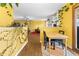 The dining room includes access to the backyard and adjoins the living room at 3280 S Ouray Way, Aurora, CO 80013