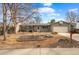 Charming single-story home featuring a two-car garage and a well-maintained front yard at 3280 S Ouray Way, Aurora, CO 80013