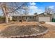 Charming single-story house with mature tree in a well-maintained front yard at 3280 S Ouray Way, Aurora, CO 80013