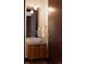Contemporary bathroom featuring a vessel sink on a wooden vanity and a modern faucet at 1133 14Th St # 1850, Denver, CO 80202