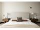 Stylishly decorated bedroom featuring bedside tables and lamps with a well-made bed at 1133 14Th St # 1850, Denver, CO 80202