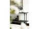 Decorated console table displaying elegant books and decor at 1133 14Th St # 1850, Denver, CO 80202