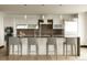 Contemporary kitchen with a central island, pendant lighting, and stainless steel appliances at 1133 14Th St # 1850, Denver, CO 80202