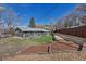 Backyard featuring artificial turf, a patio area, and garden at 3604 Collins St, Castle Rock, CO 80108